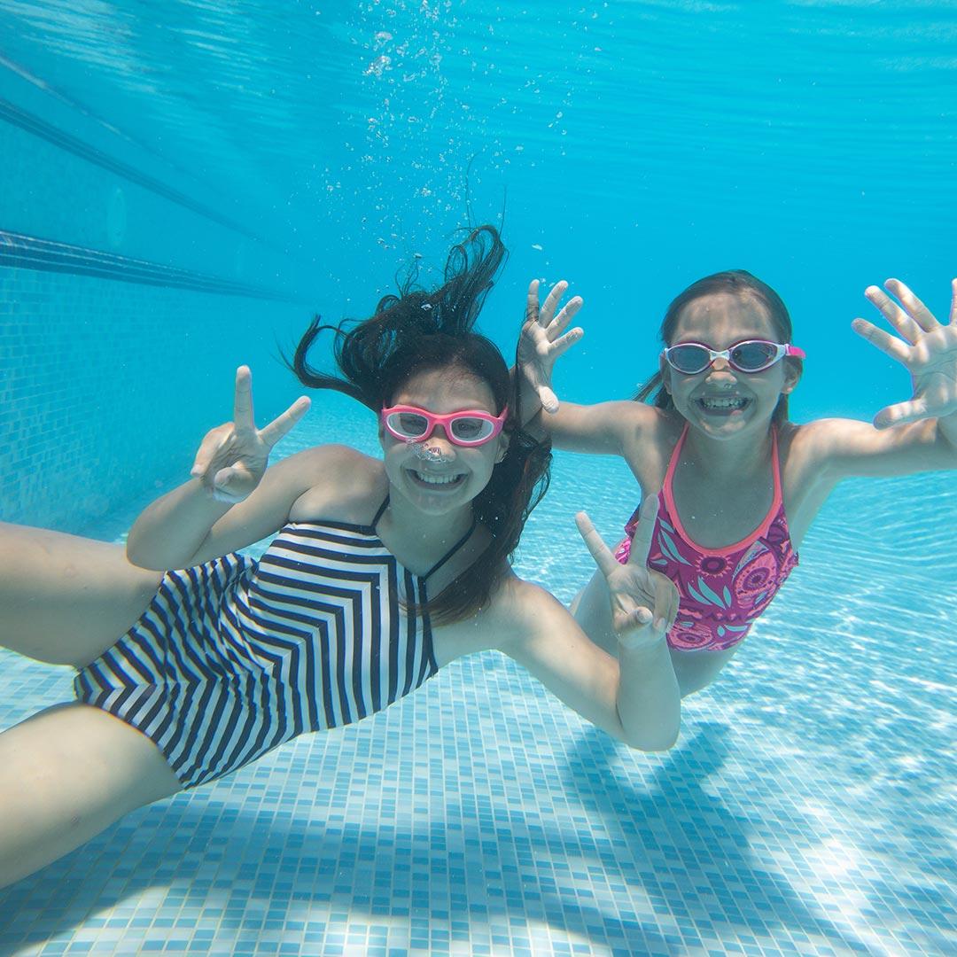 Gyms with Family Swim - Under Water Photo of Two Children Swimming